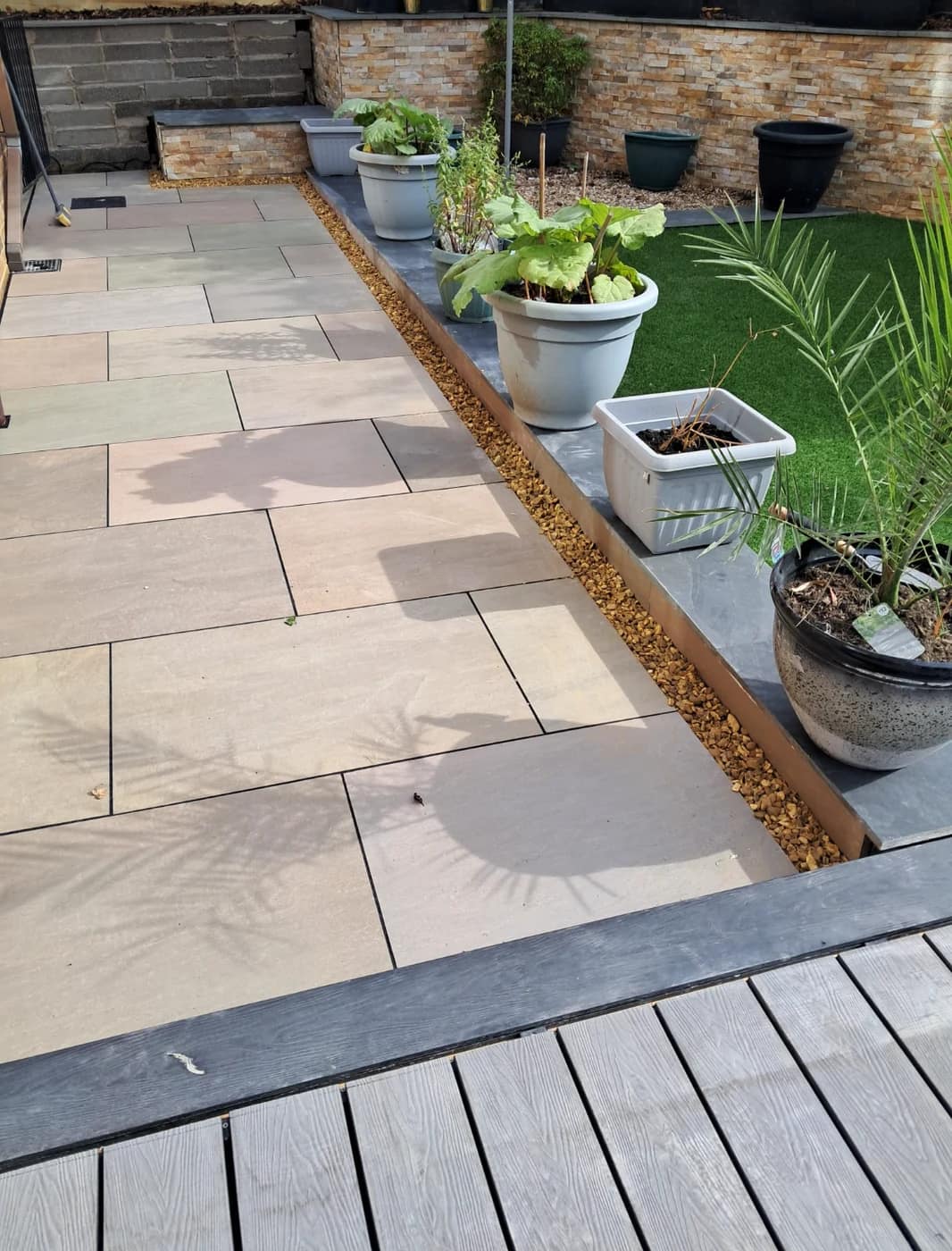 Sandstone patio slate border planters bridgend by HJB