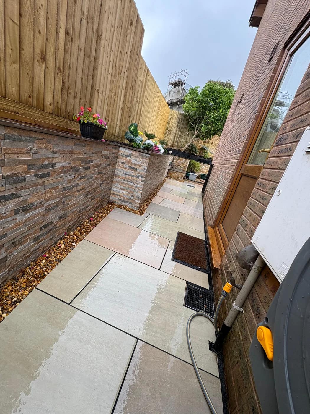 Sandstone patio stone clad wall planters bridgend by HJB