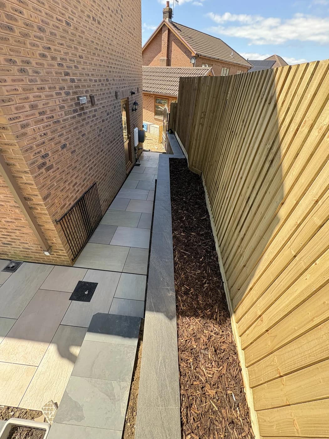 Side alley path bark chippings bridgend by HJB