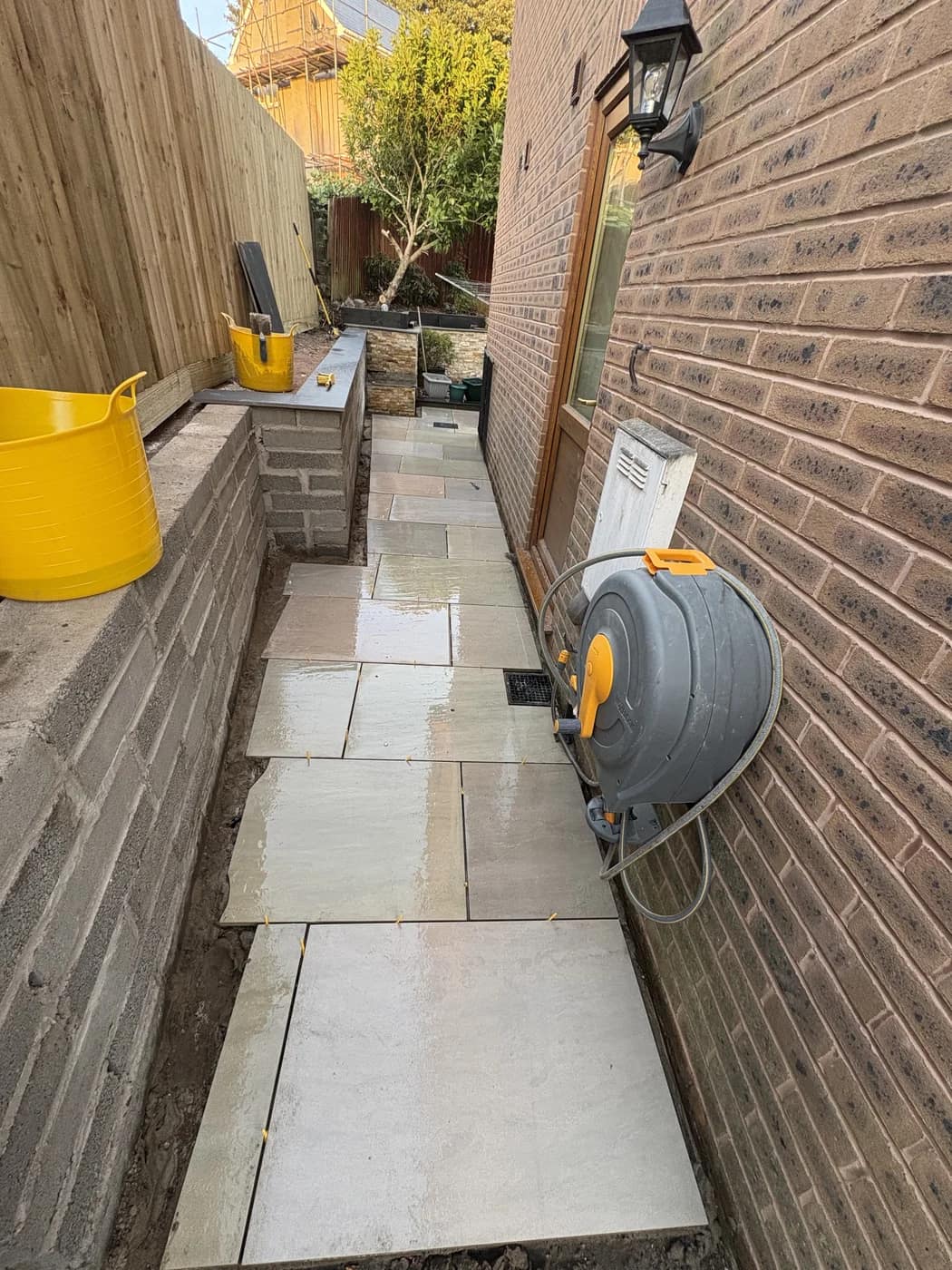 Side return sandstone path installation bridgend by HJB