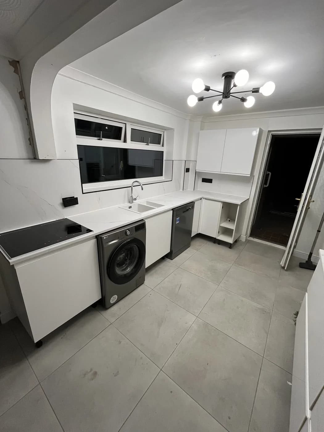 New kitchen installation with white units in Bridgend by HJB