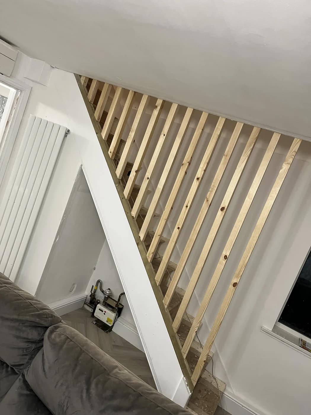 Oak slatted feature wall staircase bridgend by HJB