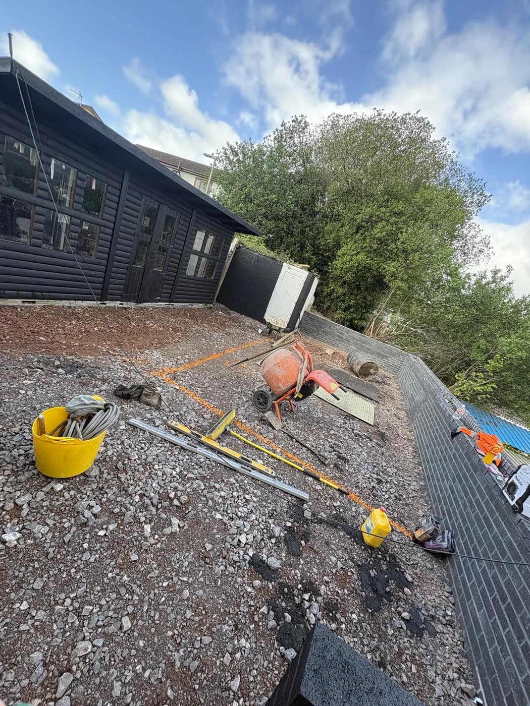 Porcelain patio installation hillside garden nantymoel by HJB