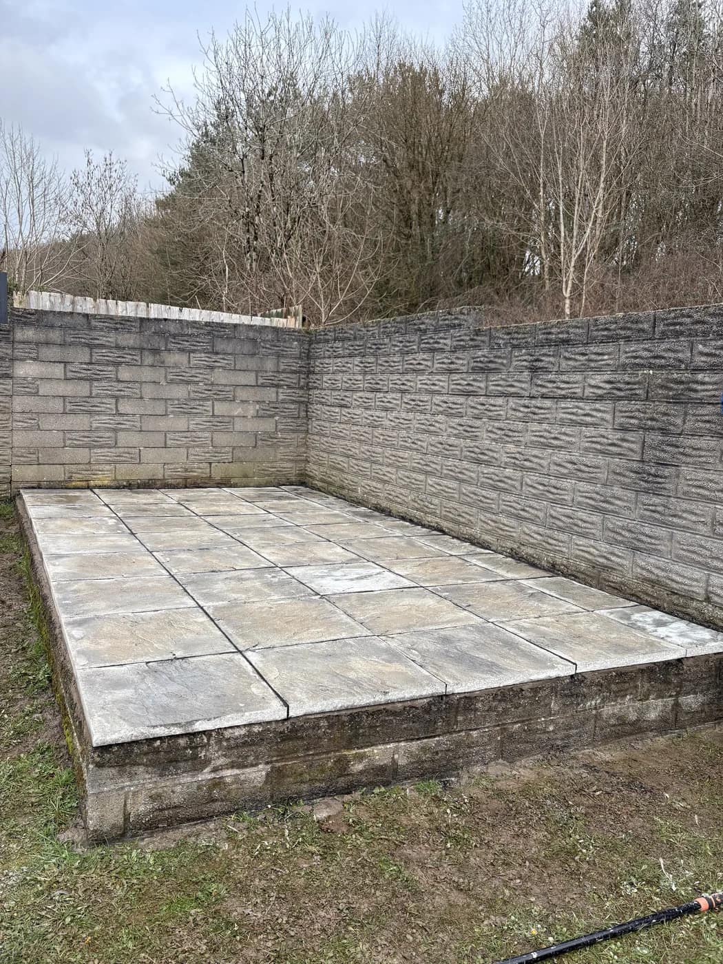 Raised paving slab terrace pencoed by HJB
