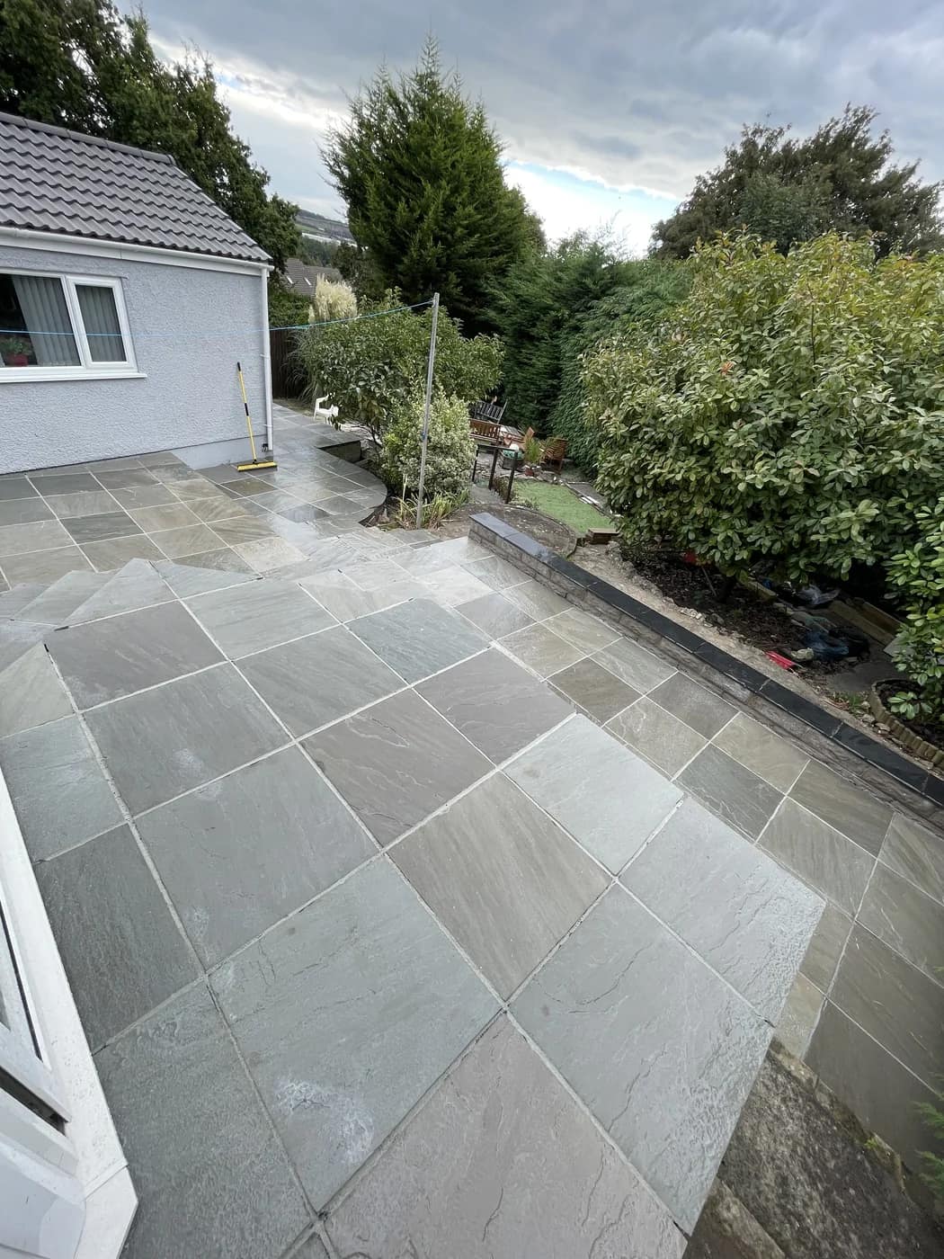 Sandstone patio bungalow rear garden maesteg by HJB