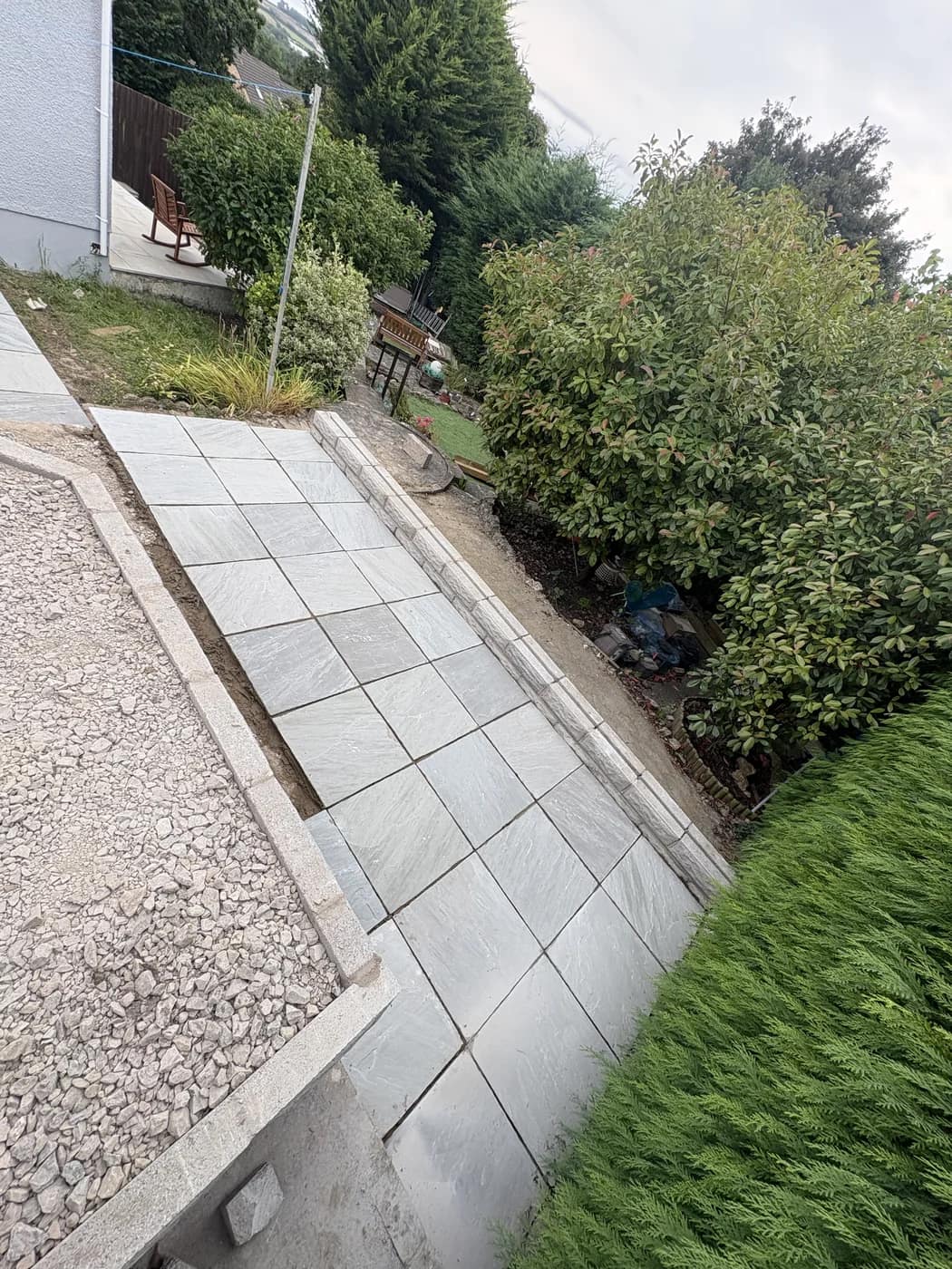 Sandstone paving path hedge border maesteg by HJB