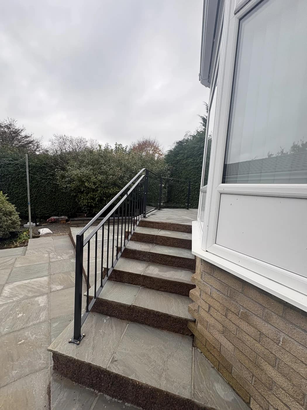 Sandstone steps black metal handrail maesteg by HJB