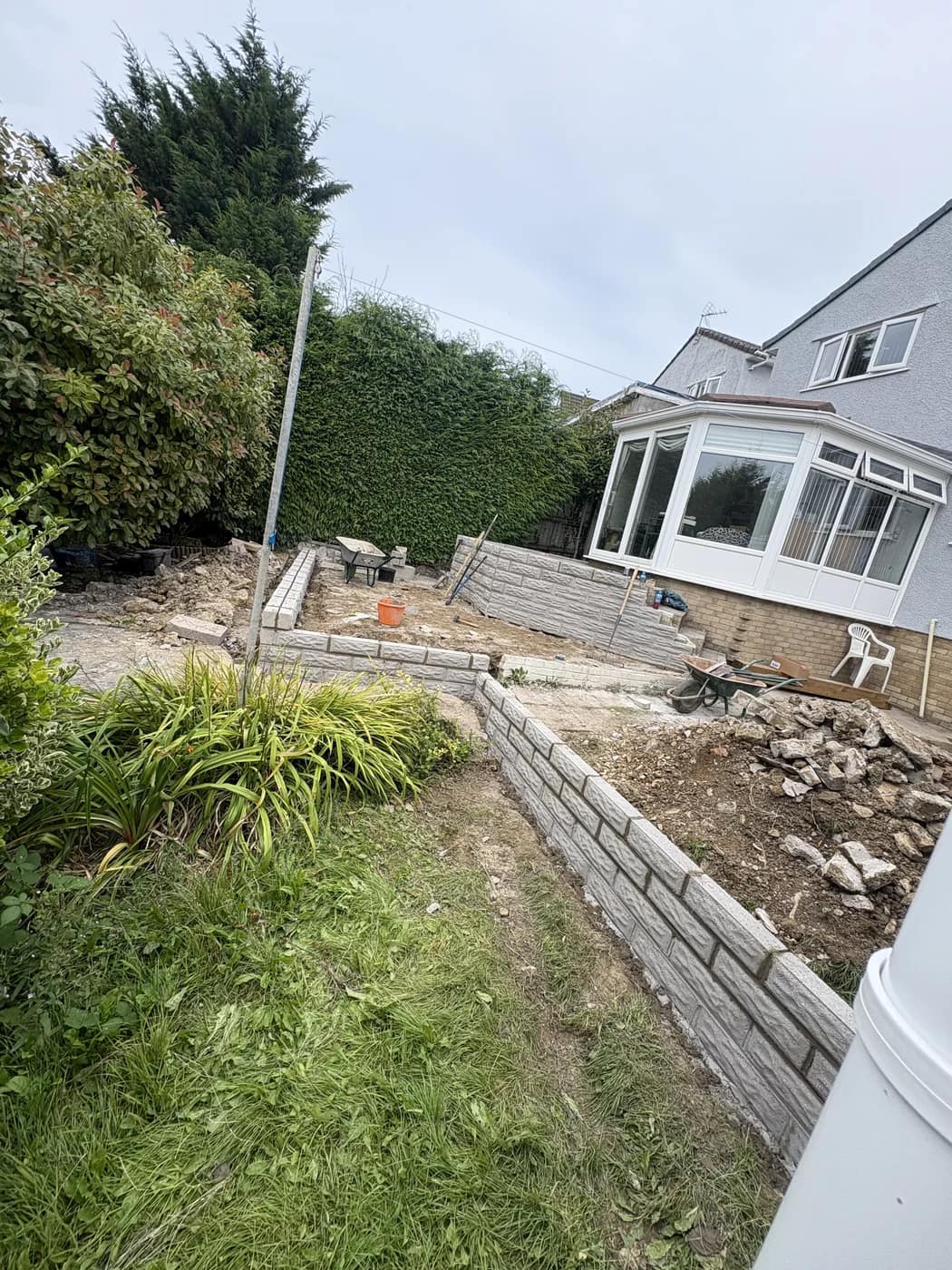 Sloping garden before landscaping maesteg by HJB