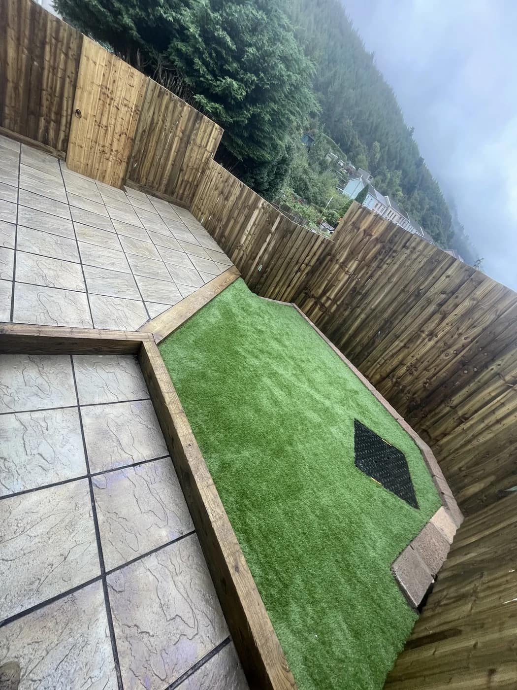 Patio artificial grass timber fence corner ogmore vale by HJB