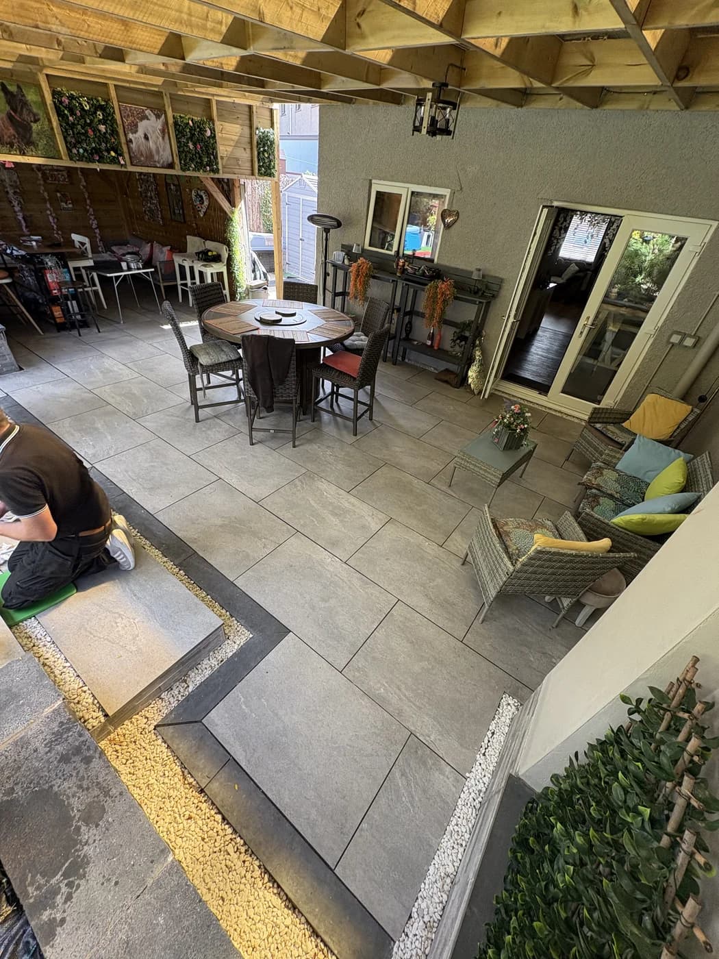 Covered outdoor dining room garden in Cowbridge by HJB