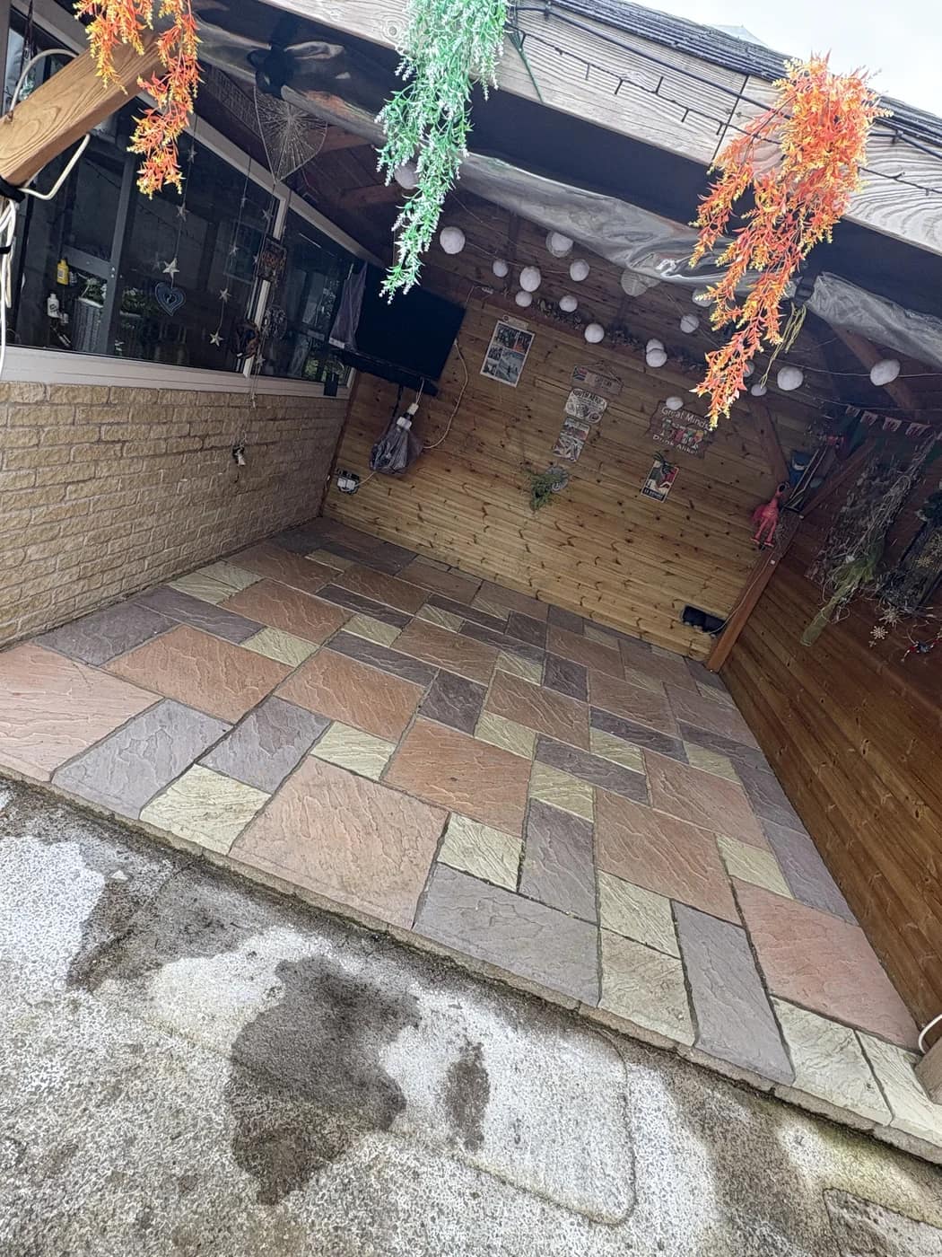 Multi tone sandstone patio covered seating cowbridge by HJB