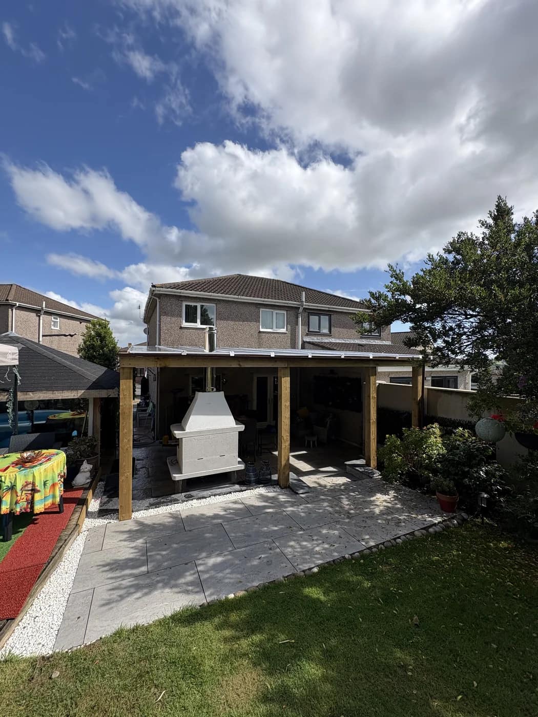 Outdoor fireplace pergola lawn garden cowbridge by HJB