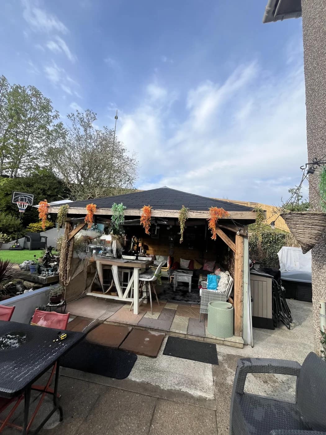 Outdoor kitchen pergola entertaining area cowbridge by HJB