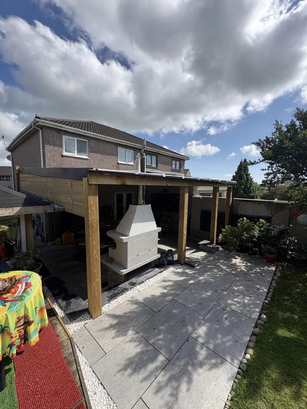 Outdoor kitchen pergola rear garden view cowbridge by HJB