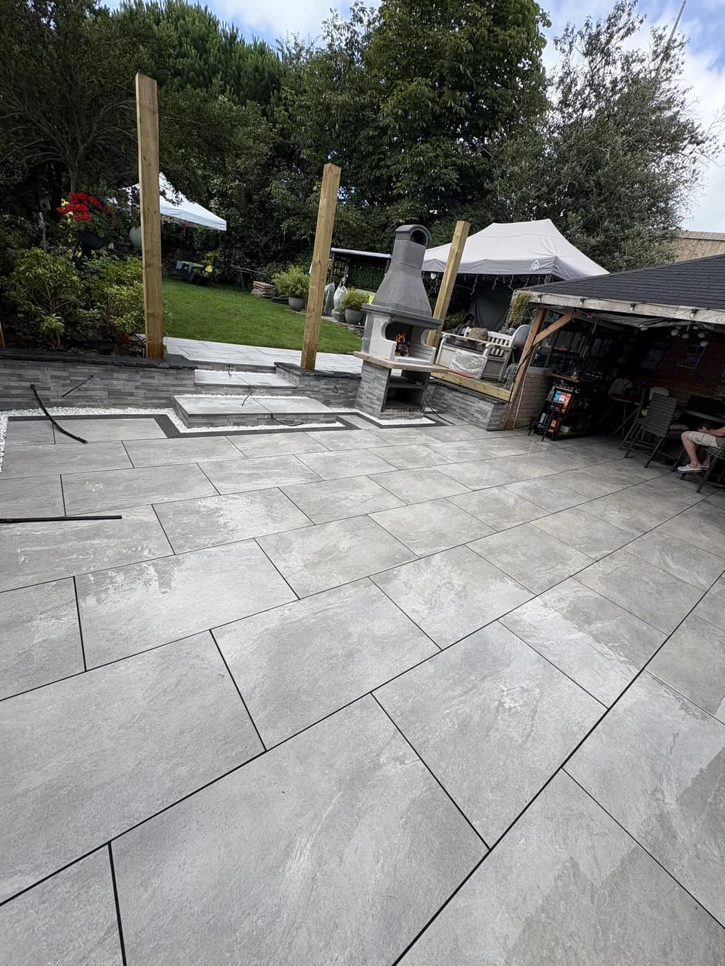 Porcelain patio outdoor kitchen pergola cowbridge by HJB