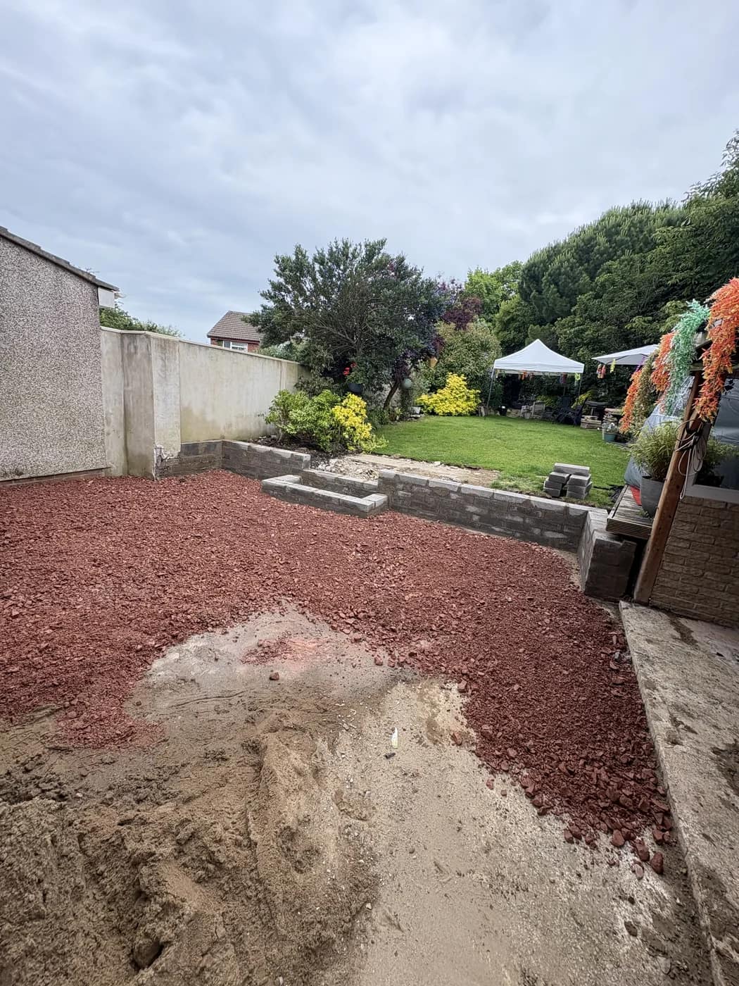 Red mulch planting bed landscaped garden cowbridge by HJB