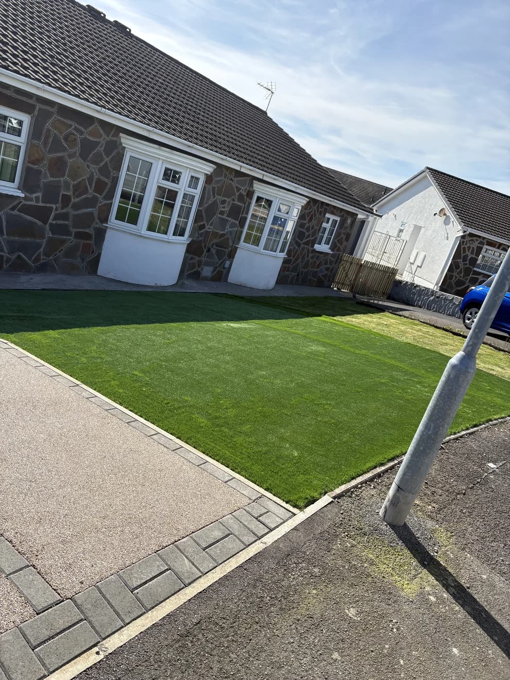 Front garden artificial grass at a bungalow in Porthcawl by HJB