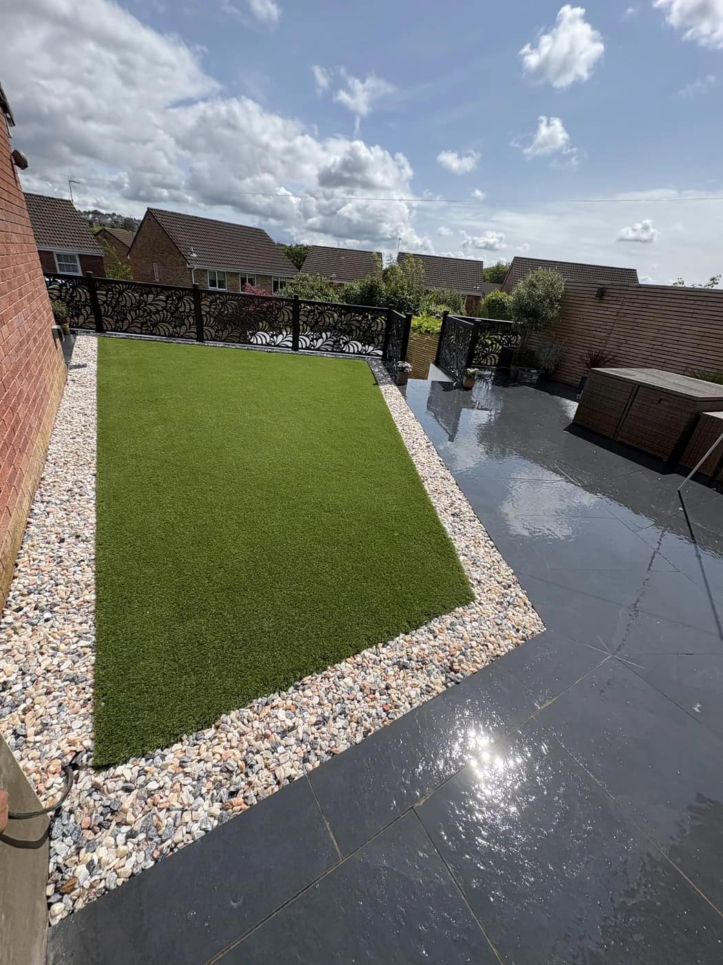 Artificial lawn black porcelain patio pergola bridgend by HJB