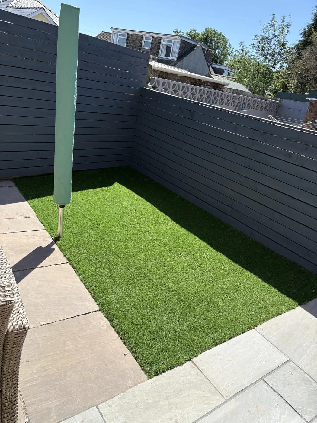 Artificial lawn sandstone patio grey fence bridgend by HJB